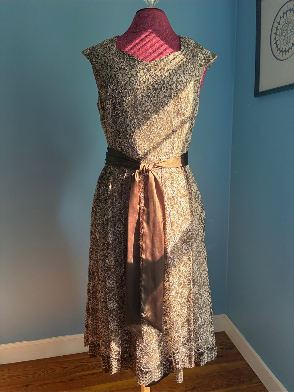 Formal lace gown 
Brown trimmed lace with cream/beige satin underlay